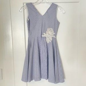 White and Blue dress with white flower detail on the front